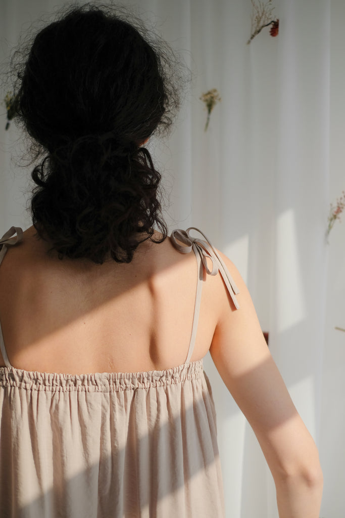  women's clothing, ethical clothing, dress, blouse, OhSevenDays, Back view of woman wearing beige jumpsuit