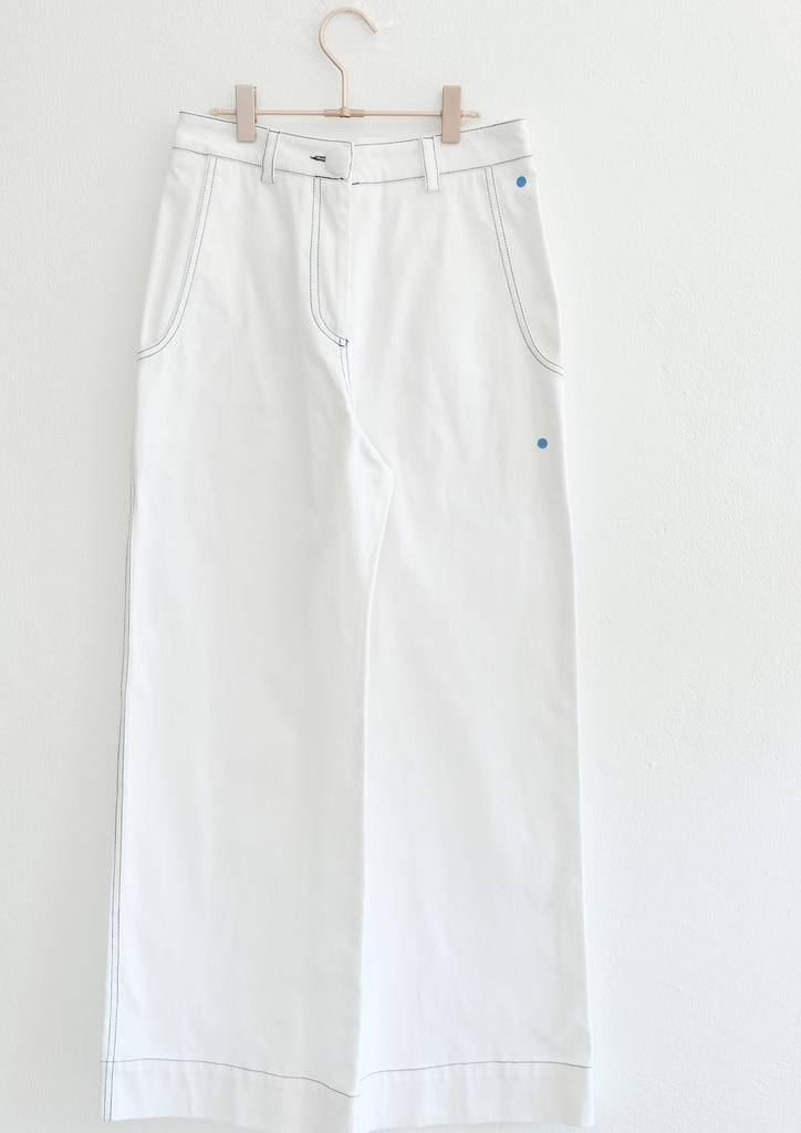 White wide legged pants on hanger 